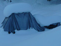 The snow is piling up for this small car
